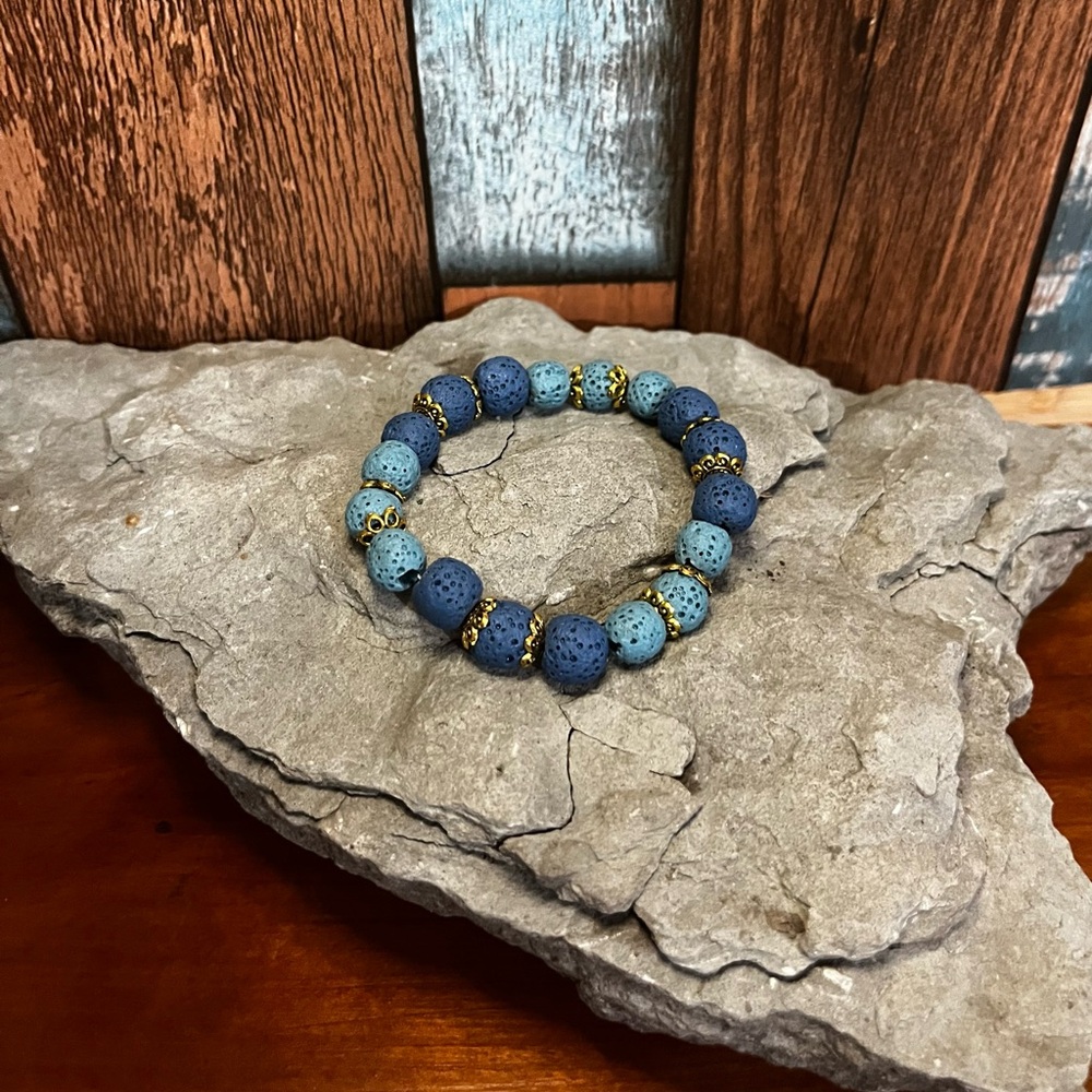 Blue lava rock and Gold Beaded stretch diffuser Bracelet